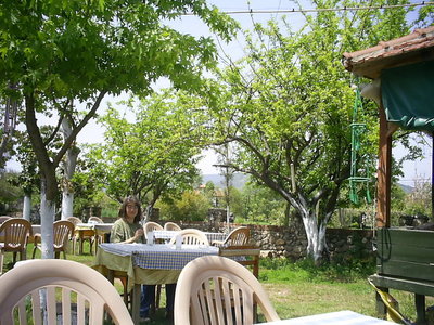 [Photo: Ayse at the restaurant]